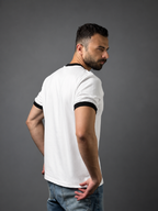 Man wearing QAIROX offwhite ringer tee with white contrast collar and cuffs
